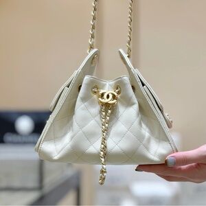 CHANEL Cream Quilted Drawstring Shoulder Bag with Gold Chain